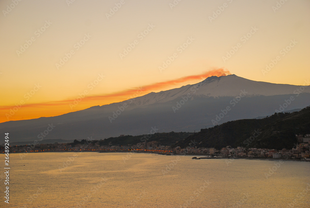 mount Etna in Sicily e and taormina's bay
