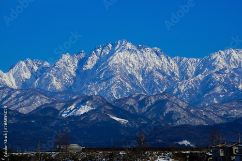 Tateyama Mountain Range seen from Toyama Plain in Japan. Mt, turugidake. 富山平野から見た立山連峰 剱岳