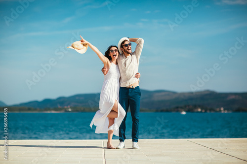 Canvas Print Couple in love, enjoying the summer time by the sea.
