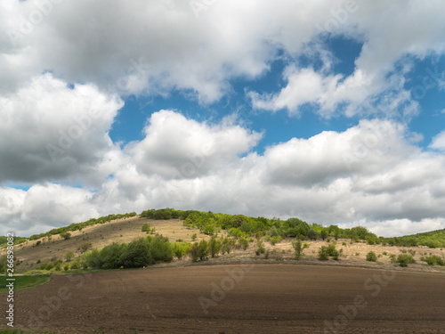 landscape with blue sky and white clouds