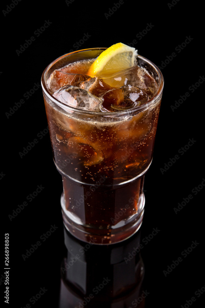 Alcoholic or non-alcoholic cocktail with cola, orange citrus, pomegranate with the addition of liqueur, vodka, whiskey, champagne or martini. Cool drink. Easy Bartenders Recipes and Ideas Alcoholic or non-alcoholic cocktail with cola, orange citrus, pomegranate with the addition of liqueur, vodka, whiskey, champagne or martini. Cool drink. Easy Bartenders Recipes and Ideas