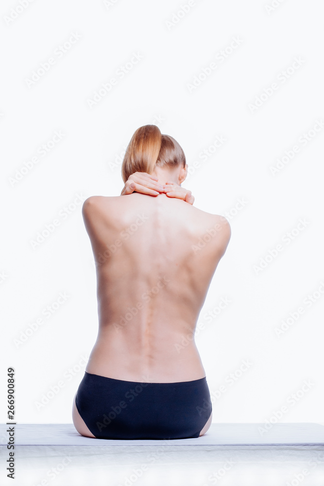 Obraz premium Back of beautiful nude woman on white background