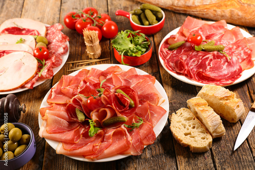assorted of delicatessen with salami, sausage, bacon and ham