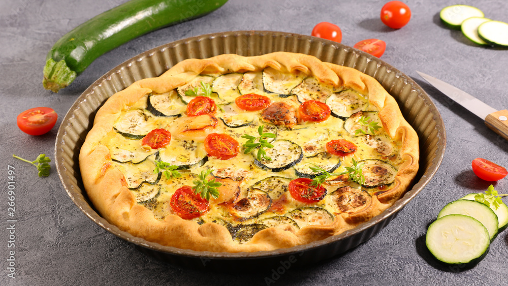 vegetable quiche with zucchini, tomato and goat cheese