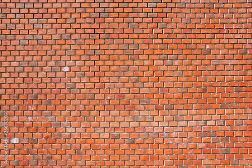 Background, texture of stone. The wall is made of bricks.