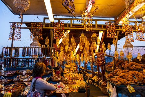 Venta de souvenirs y productos del mar en el puerto comercial, Ciudad de Rodas, Isla de Rodas, Dodecaneso, Grecia, Mar Mediterráneo photo