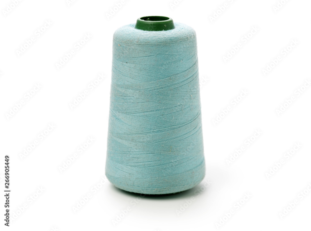 spools of thread for the textile industry on white background spools of thread for the textile industry on white background