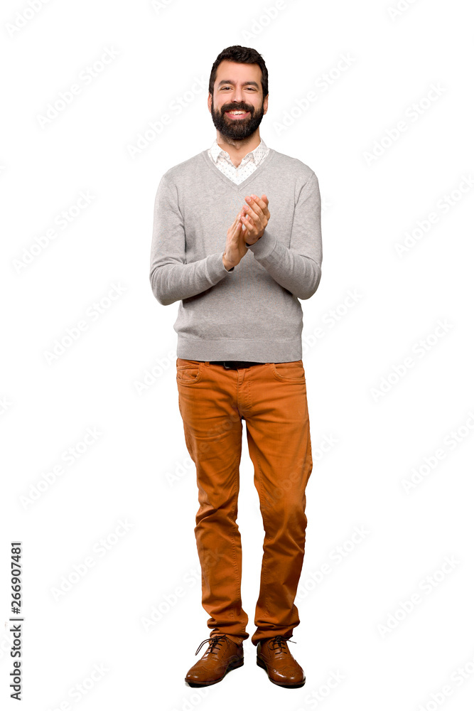 Handsome man applauding after presentation in a conference over isolated white background Handsome man applauding after presentation in a conference over isolated white background