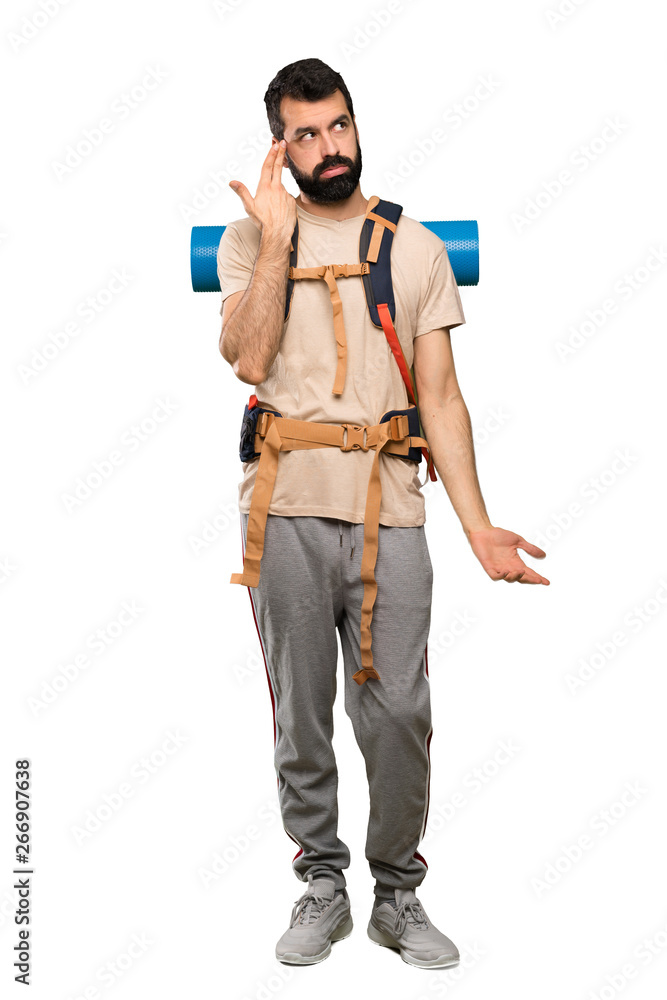 Hiker man with problems making suicide gesture over isolated white background Hiker man with problems making suicide gesture over isolated white background