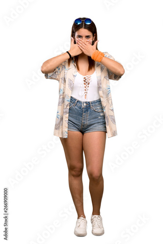 Full-length shot of Young woman in bikini in summer holidays covering mouth with hands over isolated white background