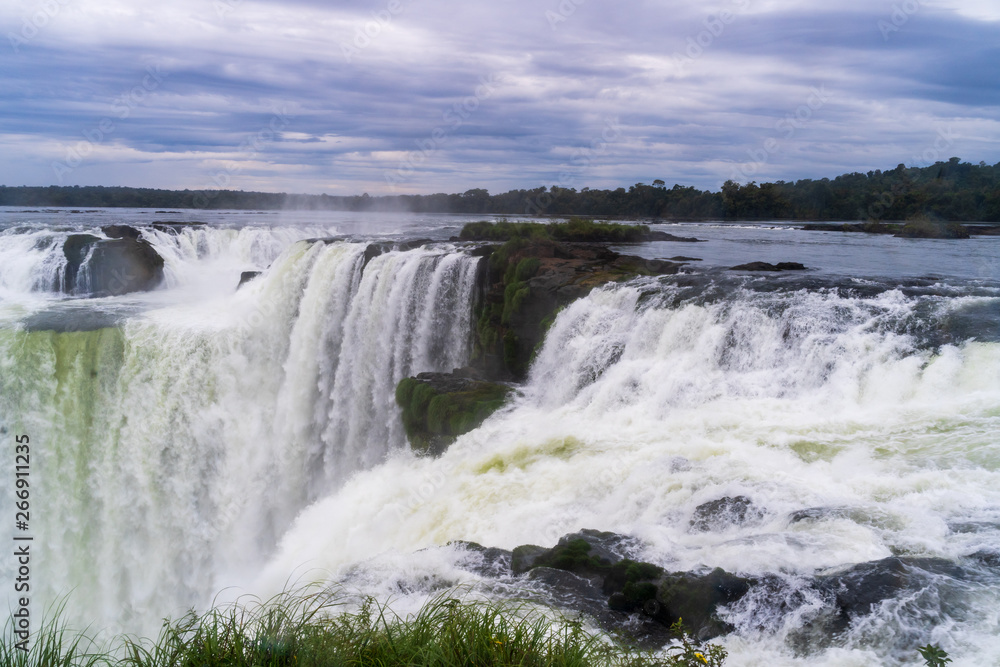 Landscape with the Iguazu Falls in Argentina, one of the Largest waterfalls in the world. Landscape with the Iguazu Falls in Argentina, one of the Largest waterfalls in the world.