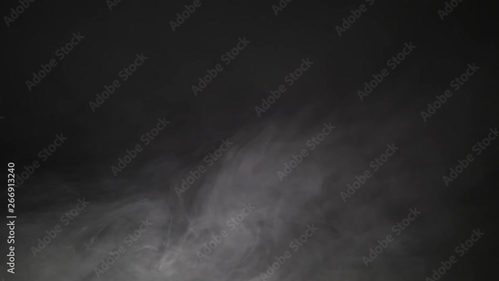 White exploding powder over black background White exploding powder over black background