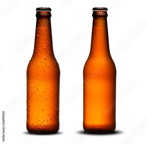 300ml beer bottles with drops and dries on white background. Pilsen.