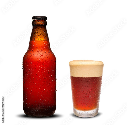 фотография 300ml beer bottles and glass beer with drops on white background.