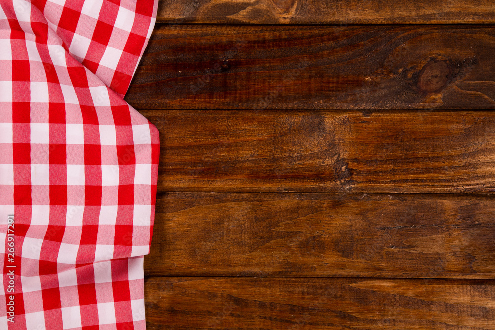 red napkin with spoon on the table red napkin with spoon on the table