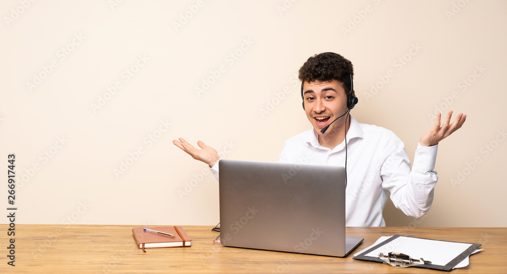 Telemarketer man holding copyspace with two hands Telemarketer man holding copyspace with two hands