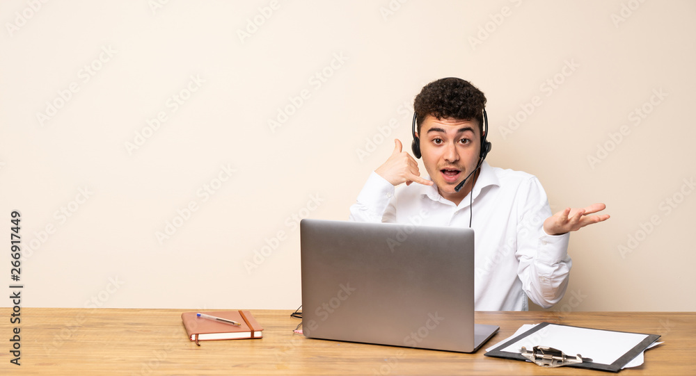 Telemarketer man making phone gesture and doubting Telemarketer man making phone gesture and doubting