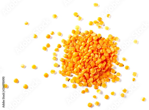 Pile red lentils isolated on white background, top view and clipping path