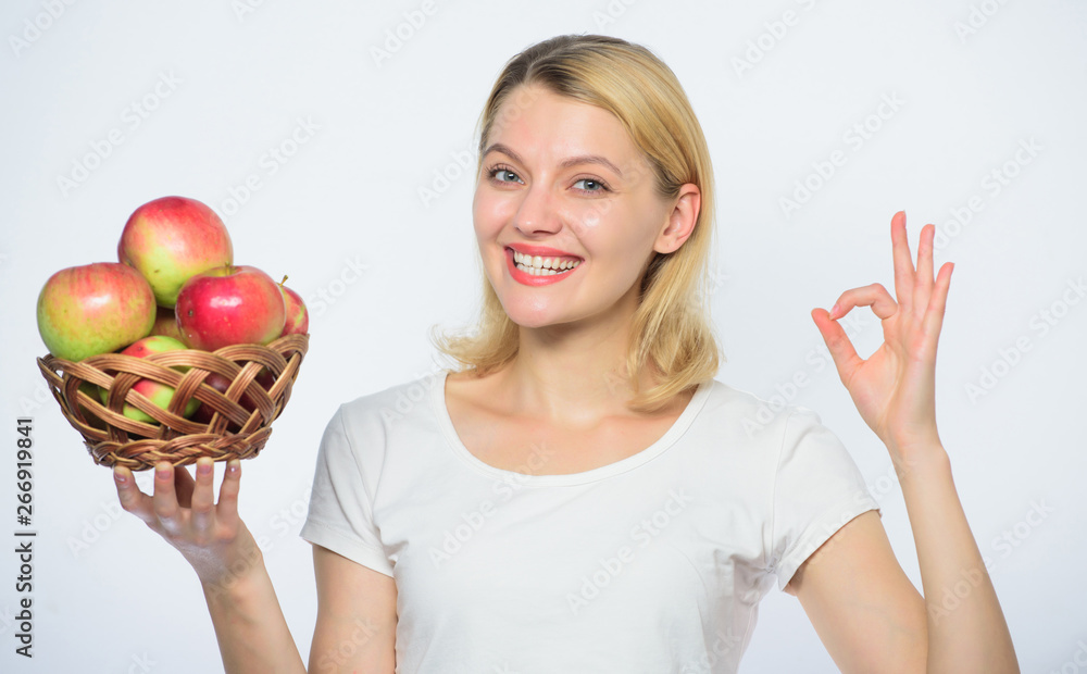 Happy woman eating apple. orchard, girl with apple basket. vitamin and dieting food. farming. healthy teeth. fall harvest. Autumn seasonal fruit. Smells great. ok gesture. Choosing the best products Happy woman eating apple. orchard, girl with apple basket. vitamin and dieting food. farming. healthy teeth. fall harvest. Autumn seasonal fruit. Smells great. ok gesture. Choosing the best products