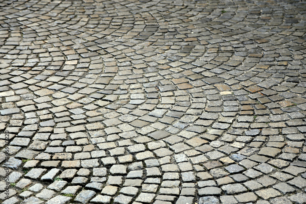 Circular cobblestone pavement - obrazy, fototapety, plakaty 