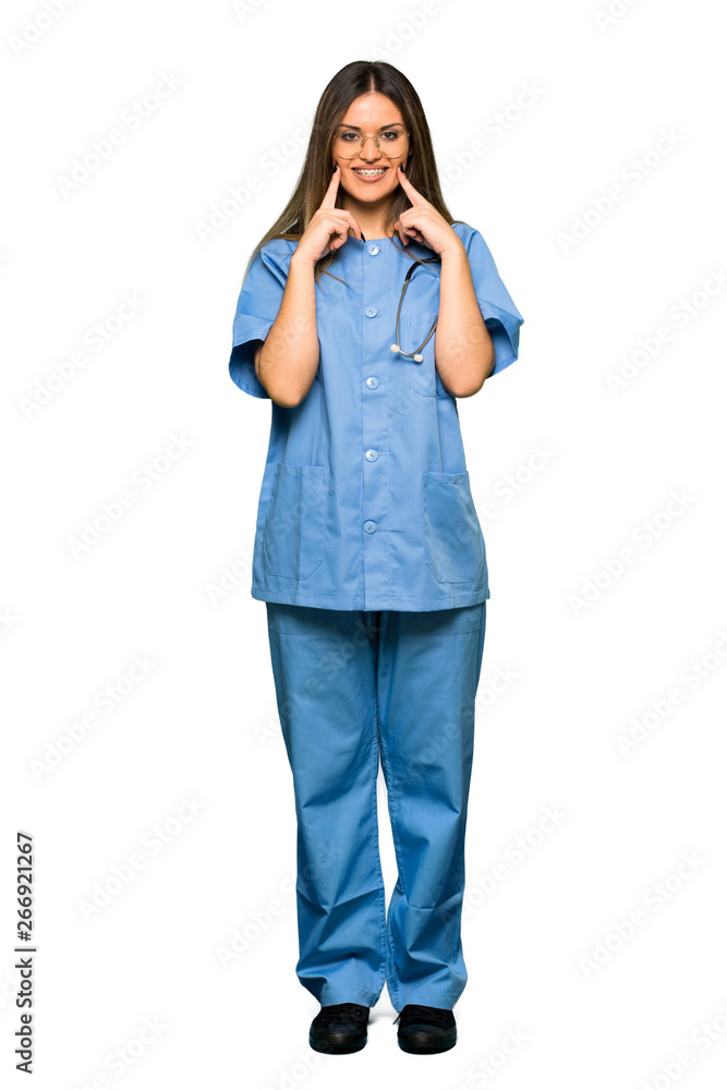 Full body of Young nurse smiling with a happy and pleasant expression Full body of Young nurse smiling with a happy and pleasant expression