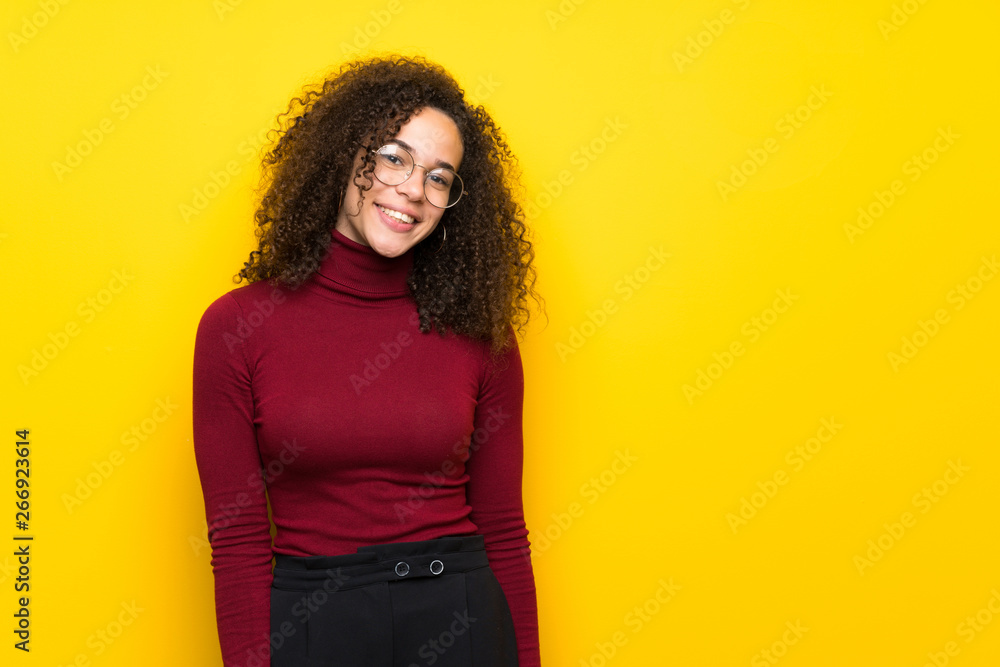 Dominican woman with turtleneck sweater with glasses and happy Dominican woman with turtleneck sweater with glasses and happy