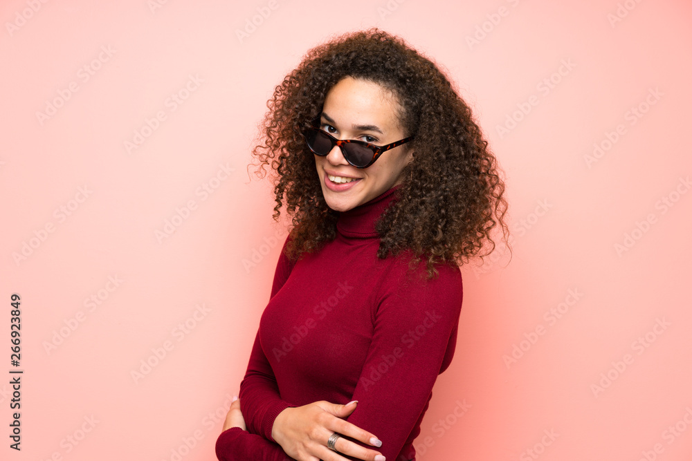 Dominican woman with turtleneck sweater laughing Dominican woman with turtleneck sweater laughing