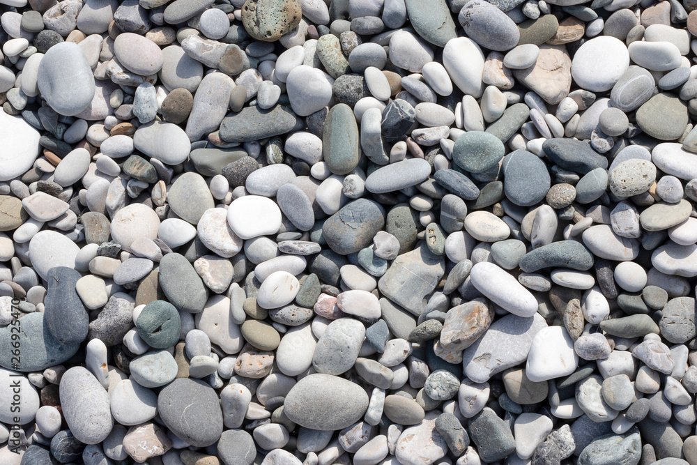 Stone round sea multi-colored. Sea pebbles texture, top view closeup. Stone round sea multi-colored. Sea pebbles texture, top view closeup.