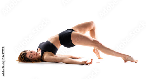 Young dance girl over isolated white background .