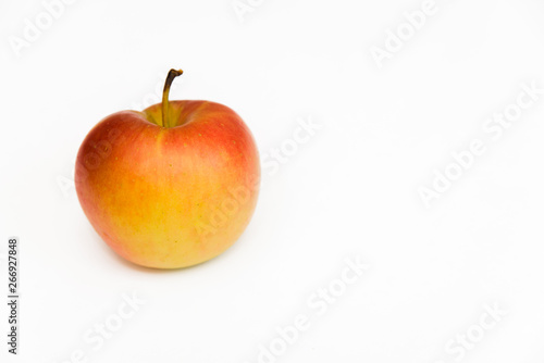 red apple is good for health and beautiful shape with vitamins on a diet on a white background