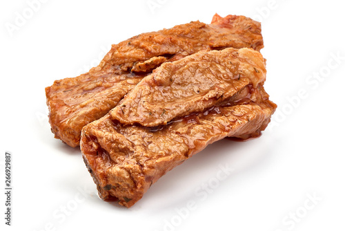 Foto Stewed pork ribs, home cooking, close-up, isolated on white background