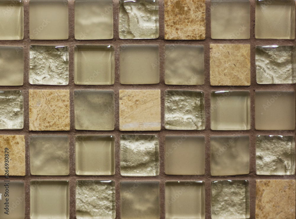 background mosaic tile of brown and beige squares of different tones and transparency monochromatic and with texture and ornament background mosaic tile of brown and beige squares of different tones and transparency monochromatic and with texture and ornament