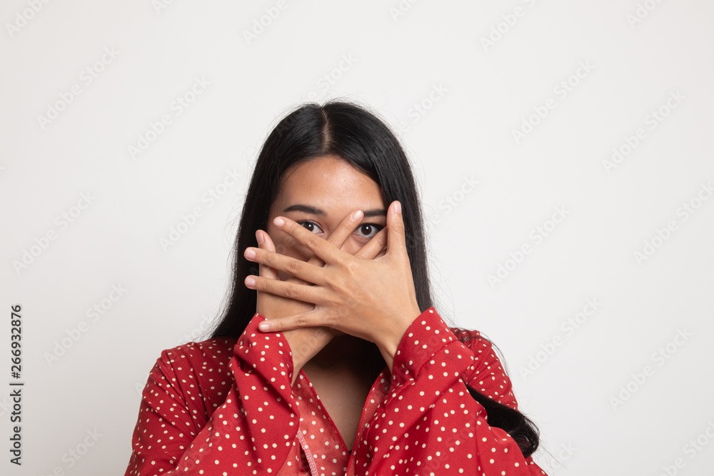Beautiful young Asian woman close her mouth. Beautiful young Asian woman close her mouth.