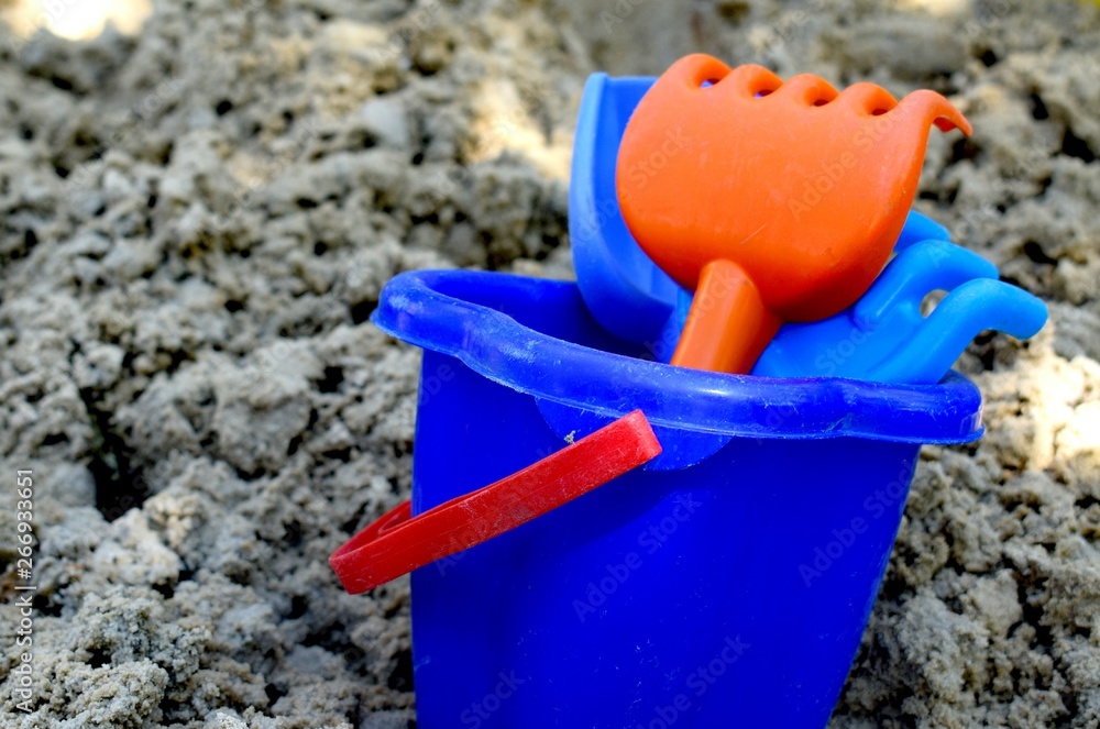 Toy bucket with spatula and rake Toy bucket with spatula and rake