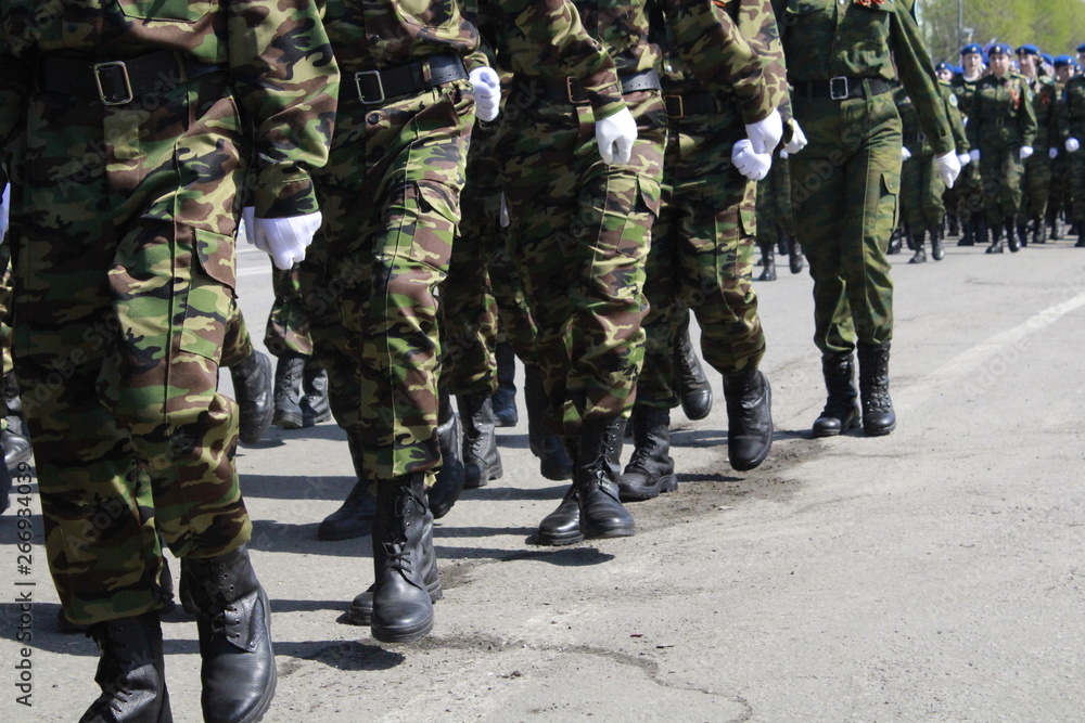 soldiers in the army marching in the parade soldiers in the army marching in the parade