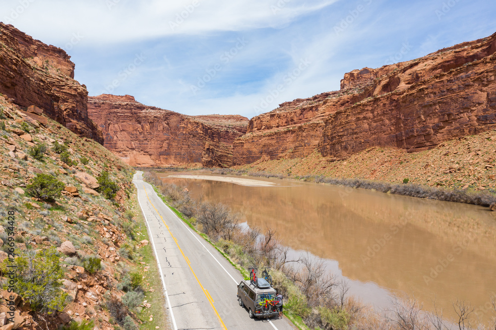 Fruita, Colorado, USA April 8, 2019: Vanagon Camper van driving towards the mountains loaded with mountain bikes