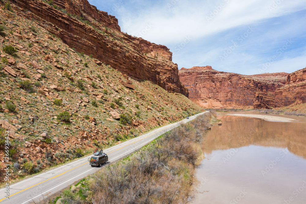 Fruita, Colorado, USA April 8, 2019: Vanagon Camper van driving towards the mountains loaded with mountain bikes