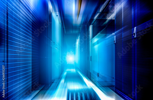Big data storage center server room motion blur futuristic background