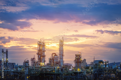 Manufacturing of oil and gas refinery industrial or Petrochemical industry plant on sunset sky background