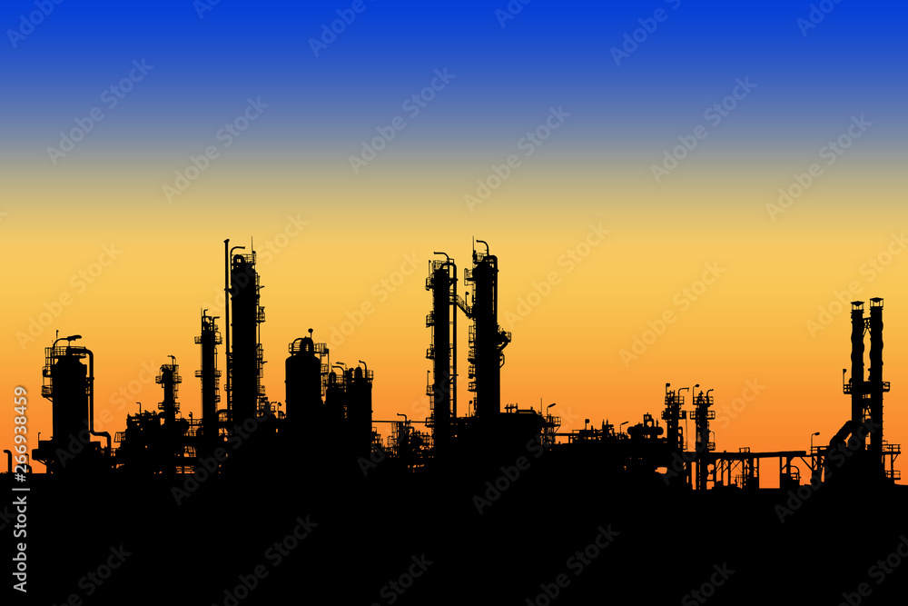 Oil and gas refinery tower in silhouette image on sunset sky background, Petrochemical industrial plant