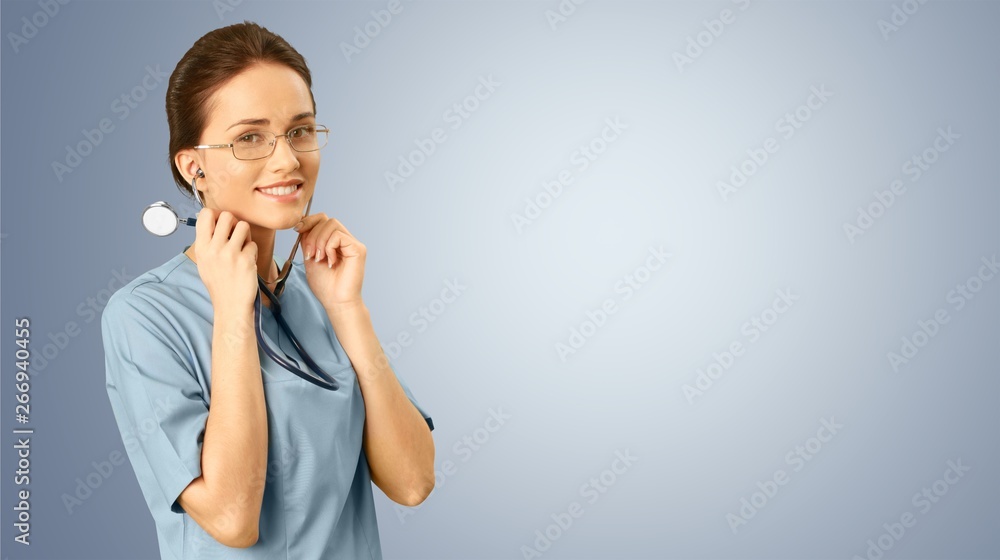 Male doctor with stethoscope on blurred hospital background Male doctor with stethoscope on blurred hospital background
