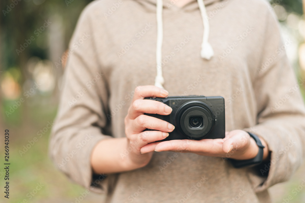 woman hold a camera woman hold a camera
