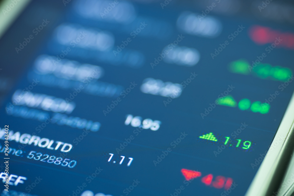 stock market application on touchscreen smartphone stock market application on touchscreen smartphone