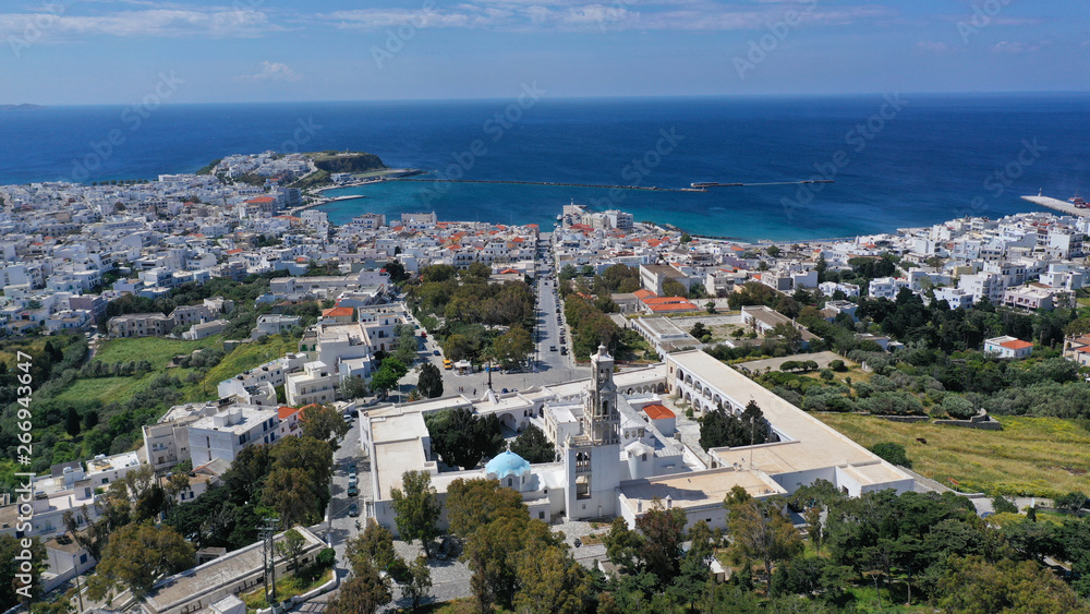Obraz premium Aerial drone panoramic photo of iconic orthodox church of Lady of Tinos island or Church of Panagia Megalochari (Virgin Mary), Cyclades, Greece