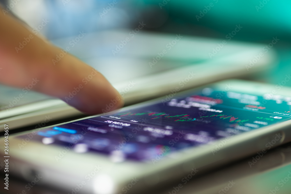 stock market application on touchscreen smartphone stock market application on touchscreen smartphone
