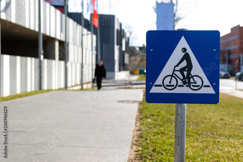 Informative road sign on city bike paths - image