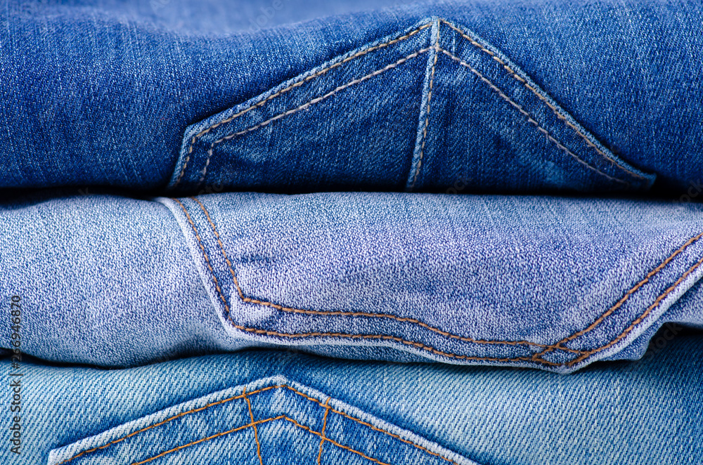 Stack of jeans. Fashion jeans macro background. Stack of jeans. Fashion jeans macro background.
