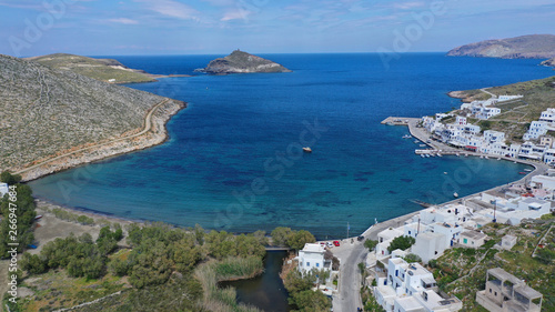Fototapeta Naklejka Na Ścianę i Meble -  Aerial drone photo of picturesque beautiful fishing village and small harbour of Panormos, Tinos island, Cyclades, Greece