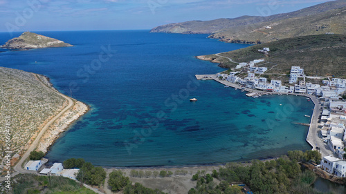 Aerial drone photo of picturesque beautiful fishing village and small harbour of Panormos, Tinos island, Cyclades, Greece