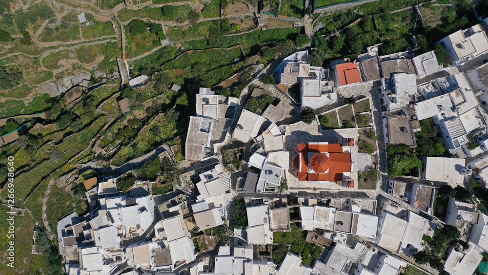 Aerial drone photo of picturesque beautiful village of Pirgos or Panormos famous from traditional marble artists, Tinos island, Cyclades, Greece